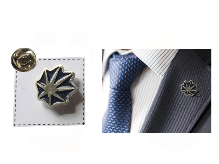 Spilletta in metallo smaltato per giacca che riprende il logo del cliente